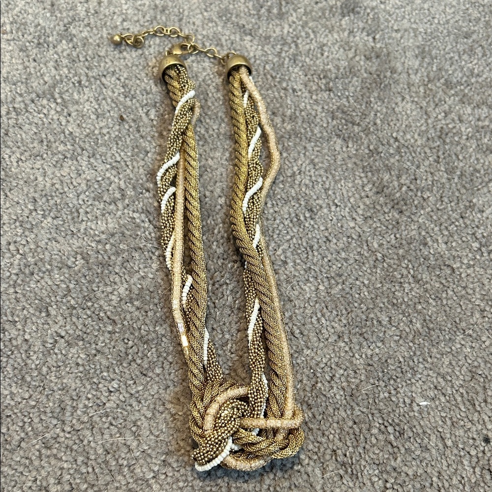 Elegant Gold and Silver Knot Necklace